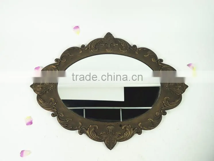 Shabby chic metal antique wall mirror in oval shape