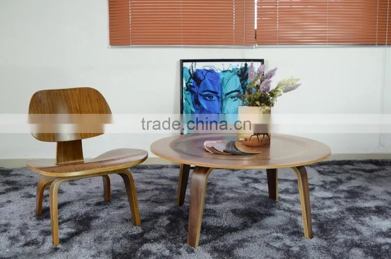 Wooden round table with four legs