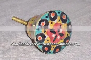 ceramic white knob with green circles