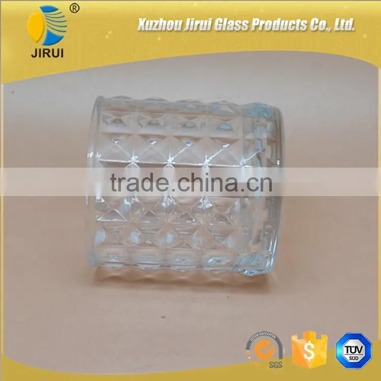 cylinder glass candle holder with engraved design