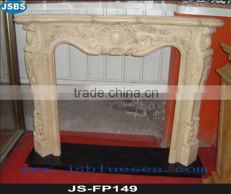 Stone carving of white fireplace mantel