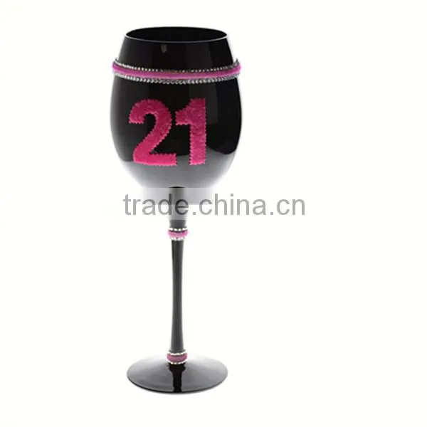 mouth blown black wine glass with decoration