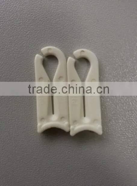 Disposable medical plastic tube slide clamp