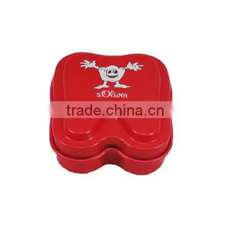 tin for soap in tooth shape