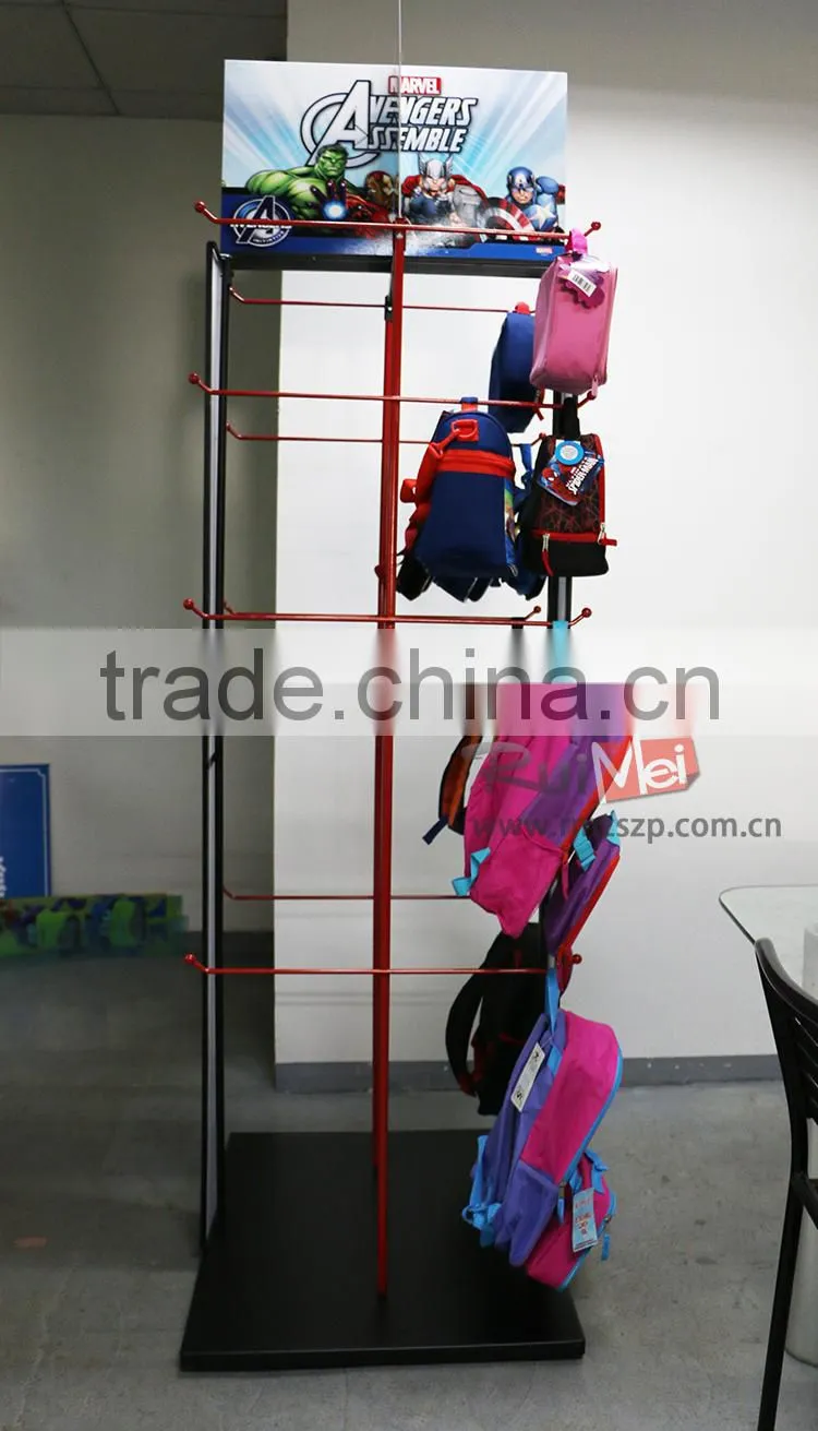 Red metal hanging bag display stand