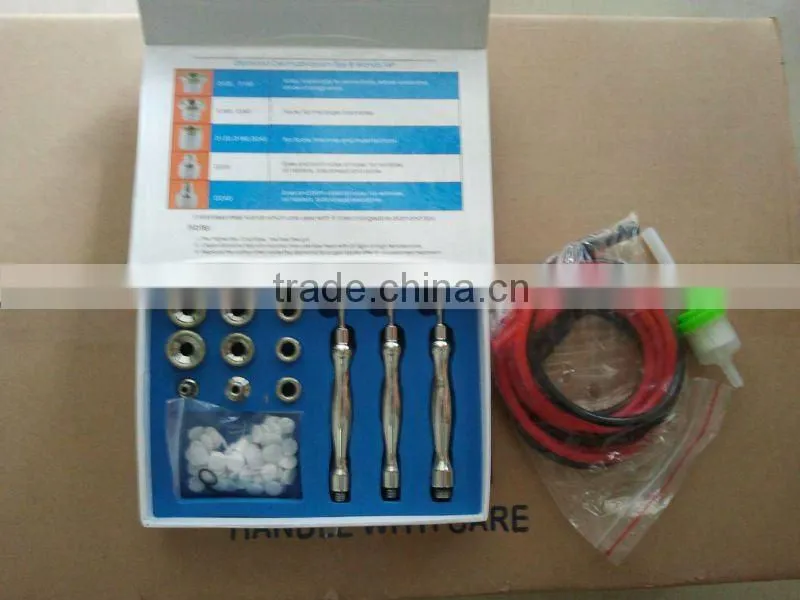 Portable diamond tip microdermabrasion machine