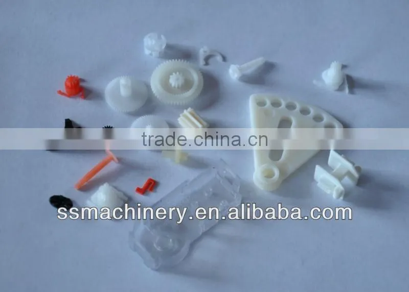 Small gears making injection molding machine