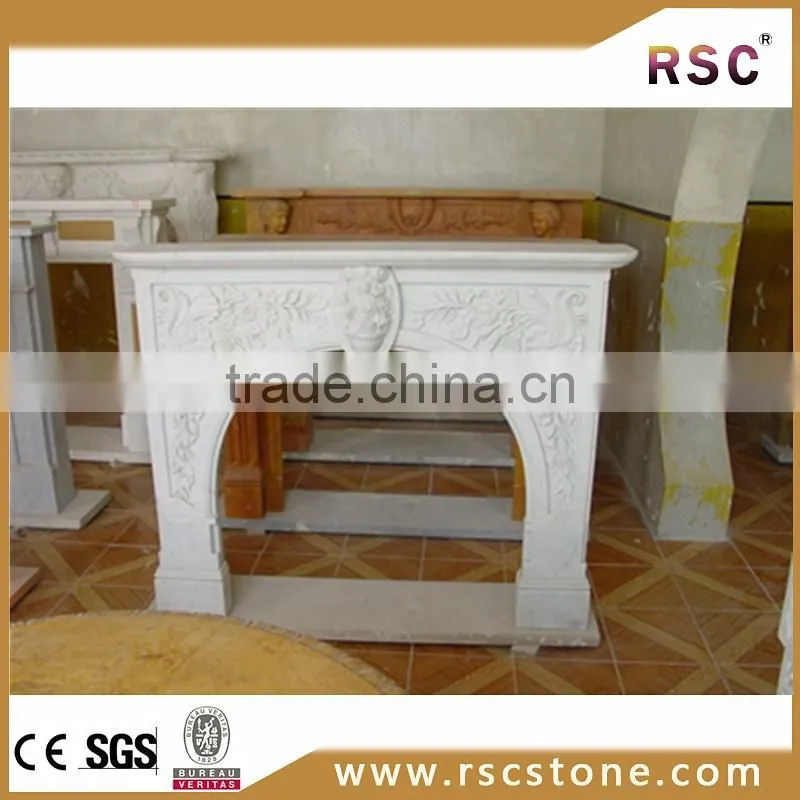 White stone pillar carved fireplace mantel