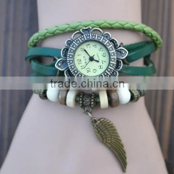 alibaba express Quartz watch F-05 for girls with Wing pendant,leather strap, bronzed watch case