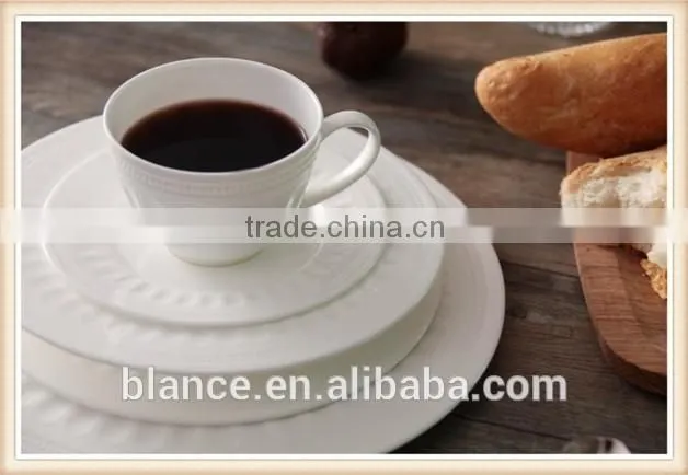 white ceramic European coffee cup set