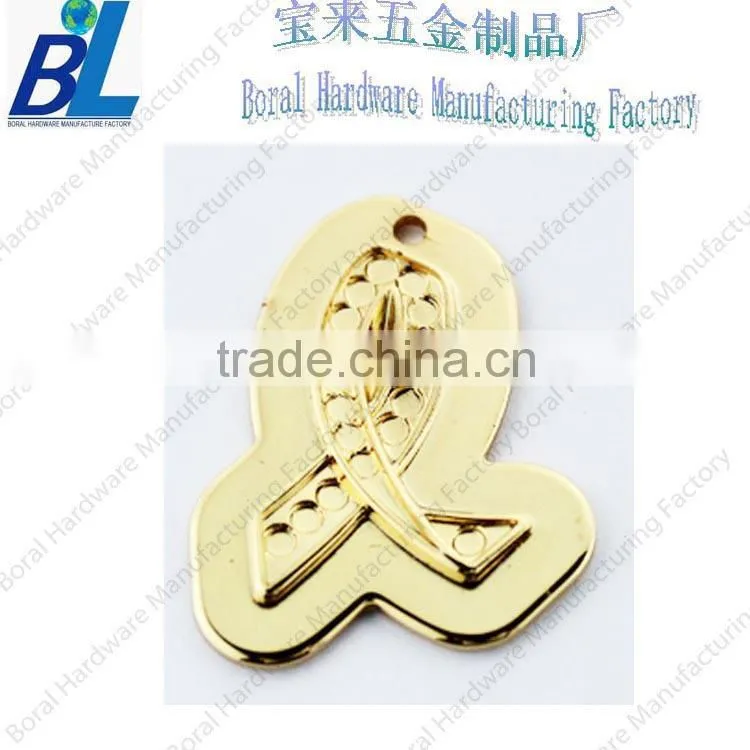 Gold-plating embossed metal zipper puller in zinc alloy