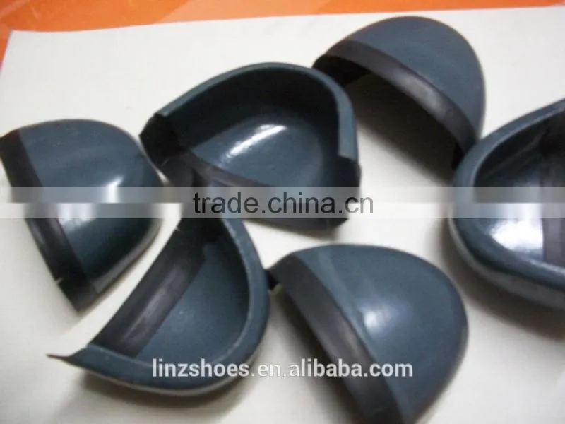 Steel toe cap and plate safety shoe