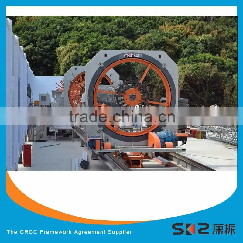 Cage assembler for the production of round cages with welded spirals and pre-set pitch