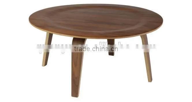 Wooden round table with four legs