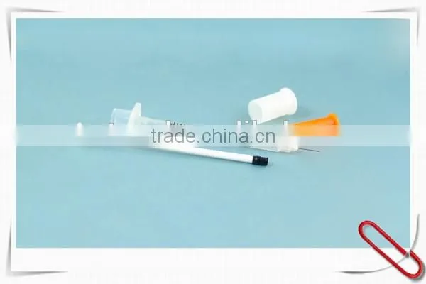 Disposable orange cap insulin syringe with fixed needle