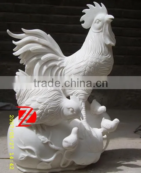 white cock statue in marble with cubs