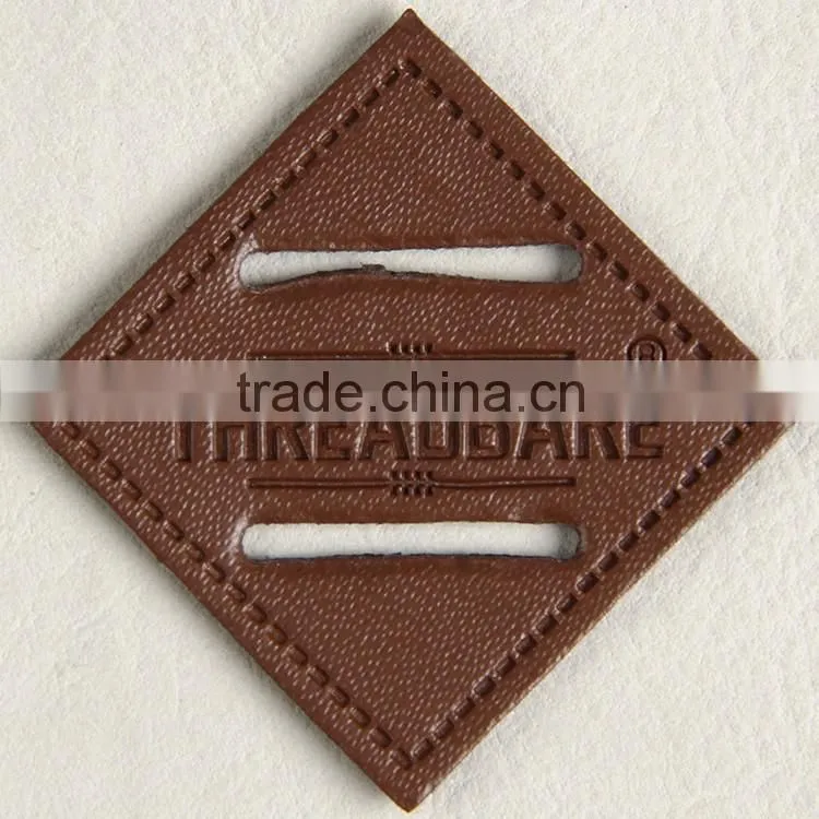 China credible label factory produce printing & embossing leather patch label for women's handbag