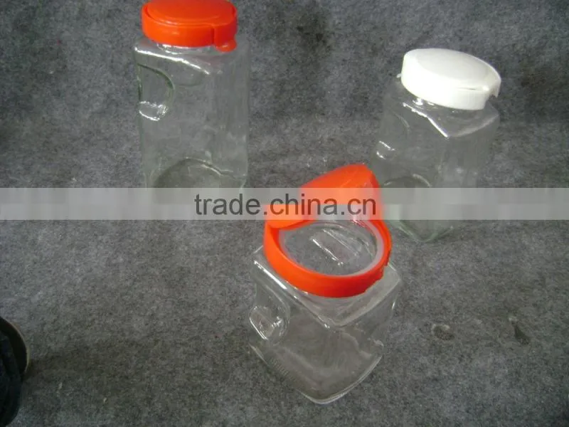 square glass jar with plastic lid