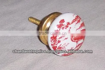 ceramic white knob with green circles