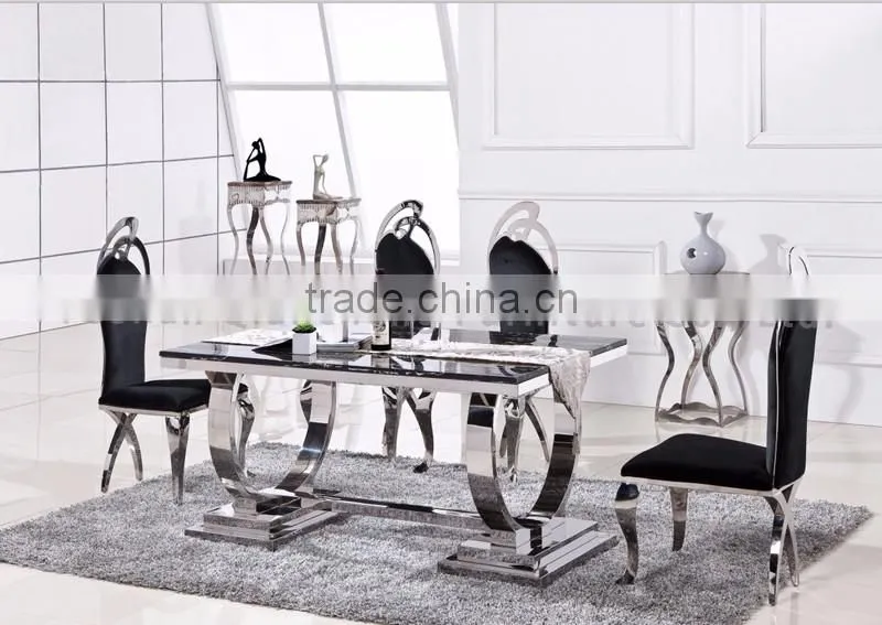 fashionable silver frame dining table with marble top