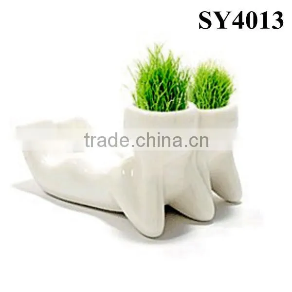 With grass hair white man growing grass doll