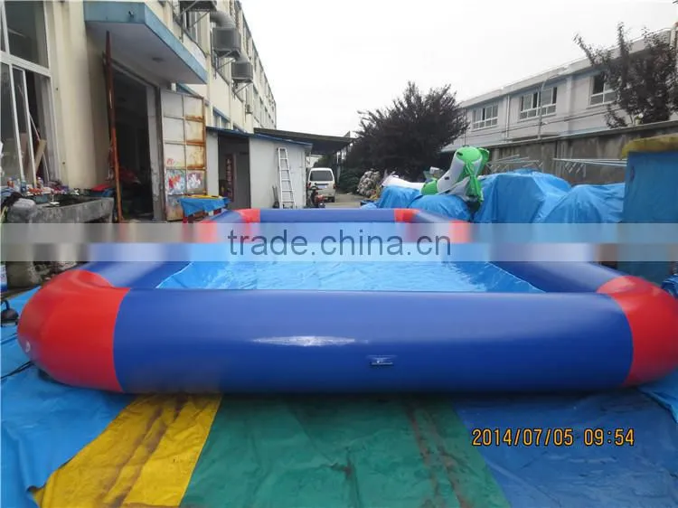 Low price floating inflatable boat swimming pool for sale