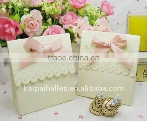 Candy boxes of miniature silver chair favor