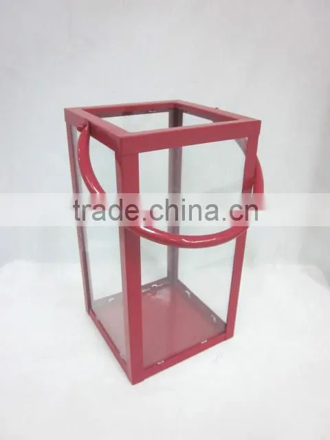 square metal lantern with clear glass piece