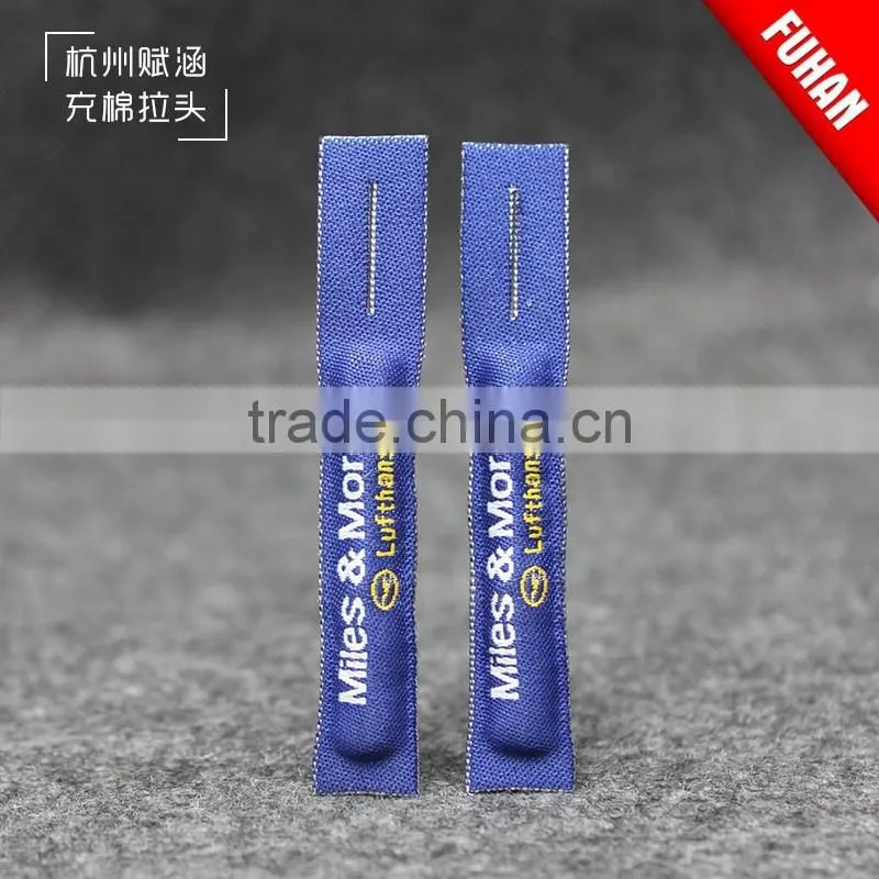 Double-sided woven zipper puller