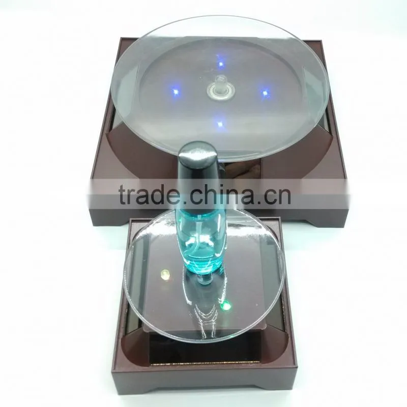 2015 New solar power rotating display stand for iphone 6 plus