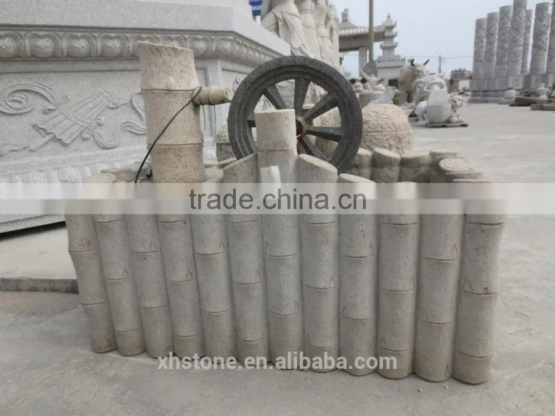 River stone fountain with litter boy statue for garden decoration
