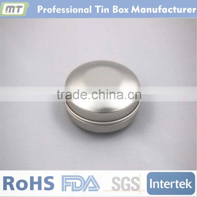 silvery round tin box for vitamin storage
