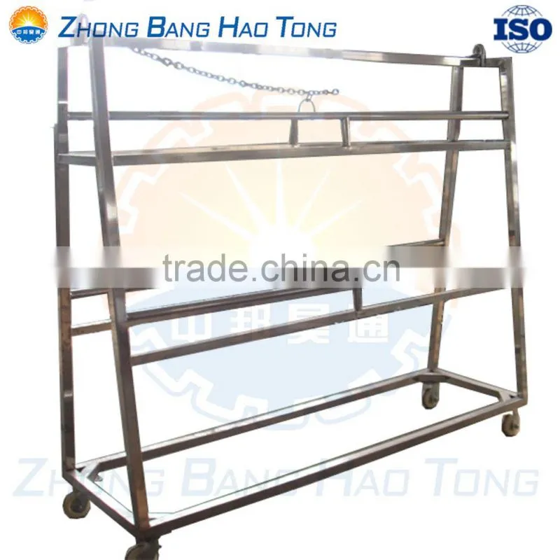 cattle ritual killing box with installed cattle catcher in cattle slaughterhouse