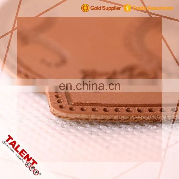 Custom thin cow skin hot stamping embossed pattern die cut shape leather label