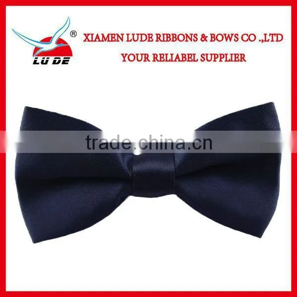 Wholesale Fasion satin ribbon bow with elastic band for packing.