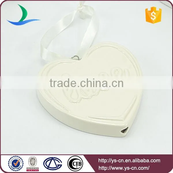 heart shape ceramic decoration with love relief