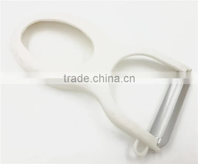 Plastic slicer and peeler for vegetable