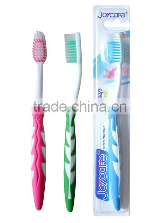 Soft toothbrush with suction cup