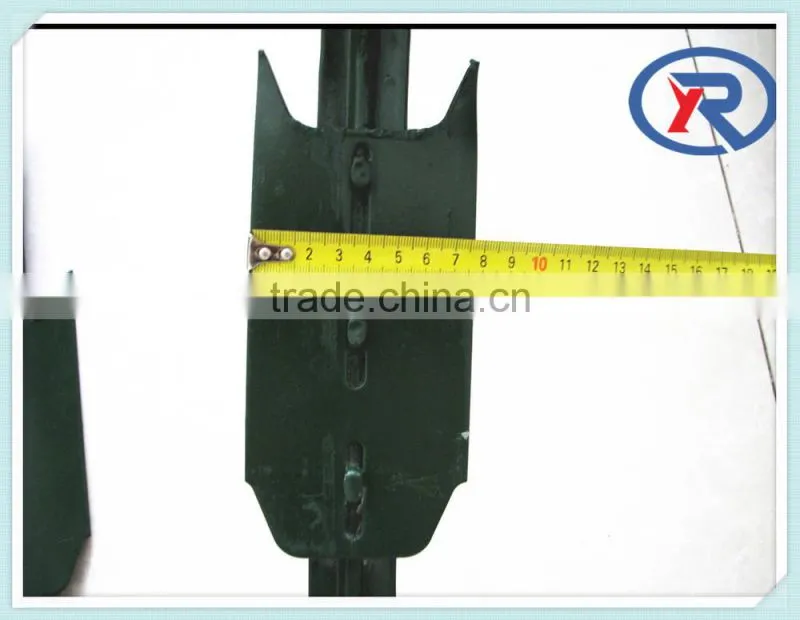 green painted metal studded t post