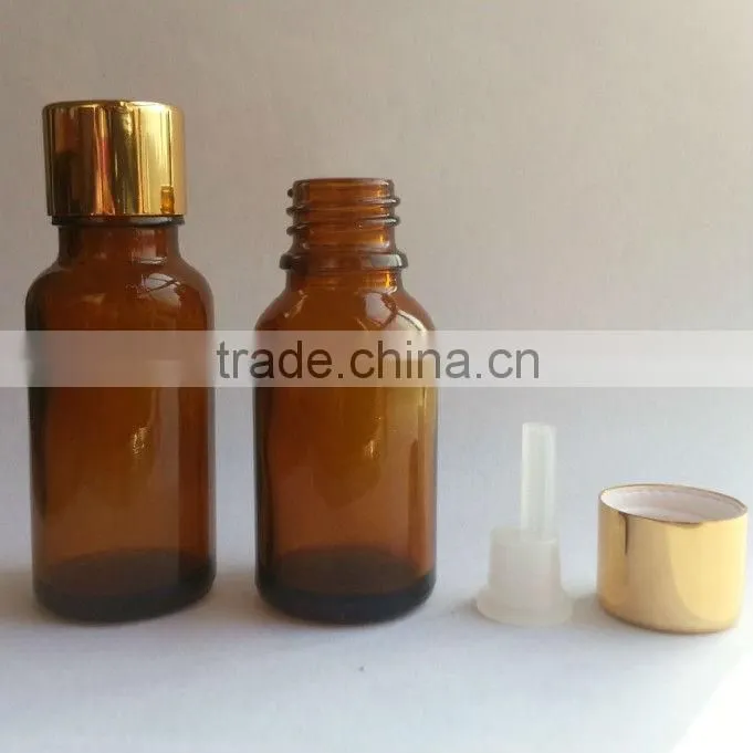 glass essential oil bottle with plastic cap and rubber dropper