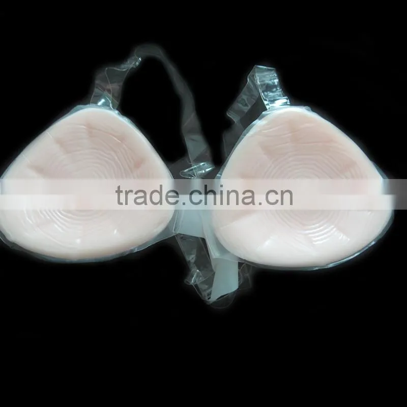 New design triangle shape artificial breast with strap