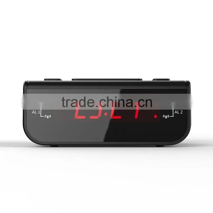 Radio alarm clock with speaker