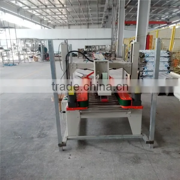 Top and bottom carton box sealing machine