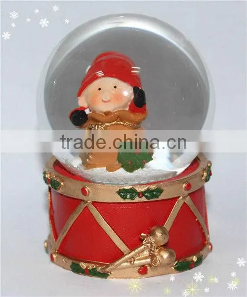 Resin santa snow globe with blowing snow