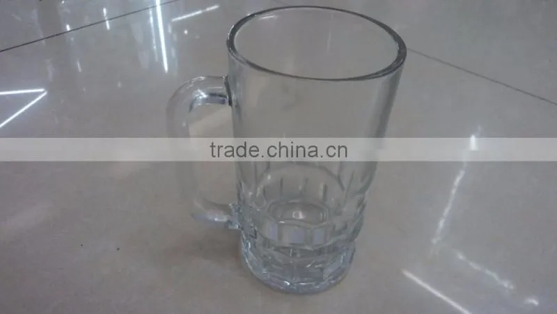 Clear glass water jug with side handle for cold drinks