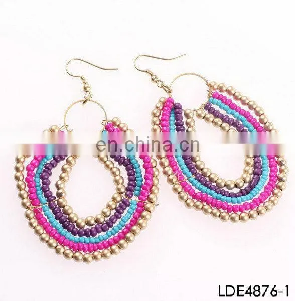Aquamarine crystals embelished chevron dangle earrings