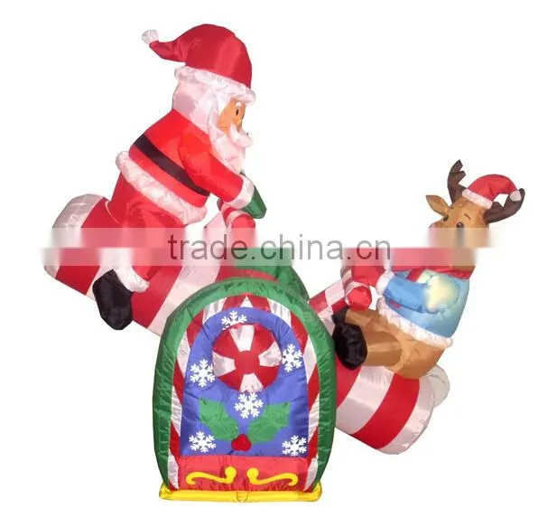 Christmas Decorations Animated Inflatable Santa and Reindeer on a Teeter Totter