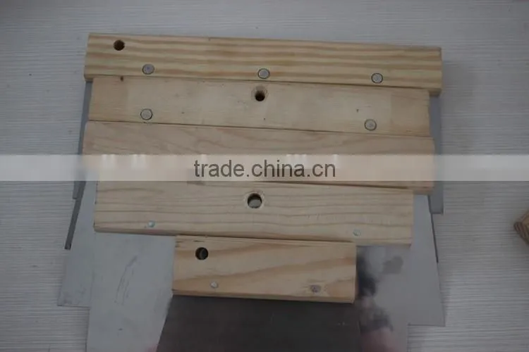 Stainless steel blade scraper with wooden handle