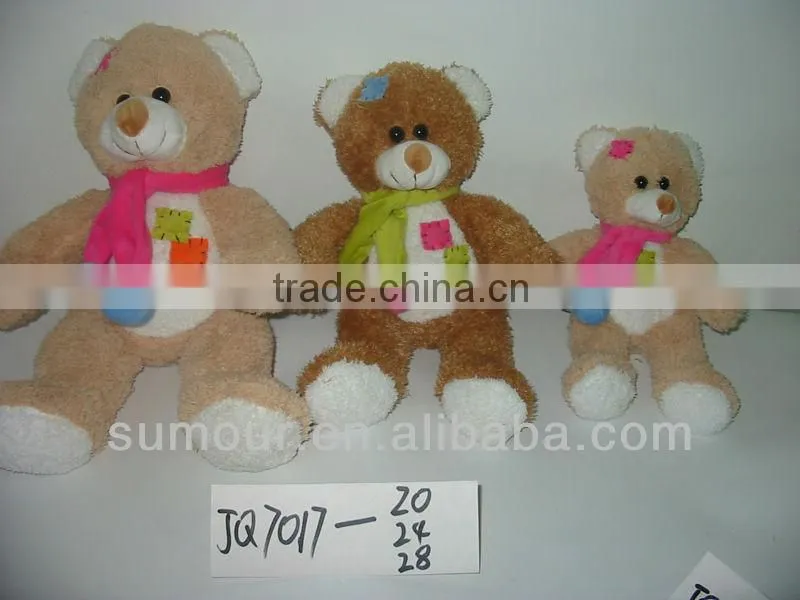 Cute Teddy Bear Plush Toy with a flower