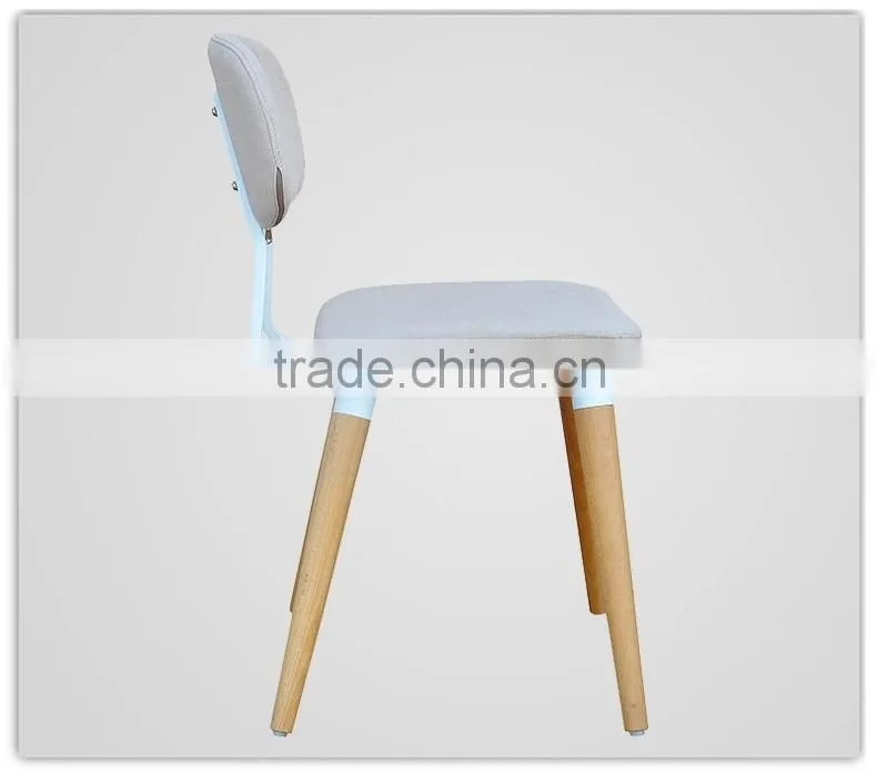 blue fabric upholstered dining room chair with leather